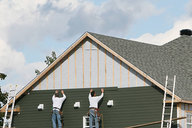 Professional Siding Replacement technician working in Trinway, OH
